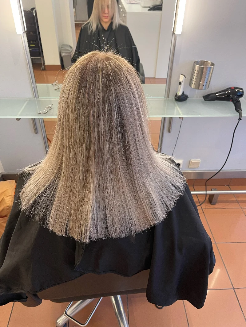 Vorher-Nachher-Bild einer Haartransformation bei AG Haarwelt